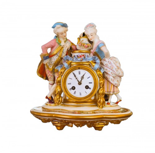 Pendule romantique en porcelaine et biscuit