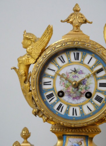 A gilt bronze and painted porcelain clock - Louis-Philippe
