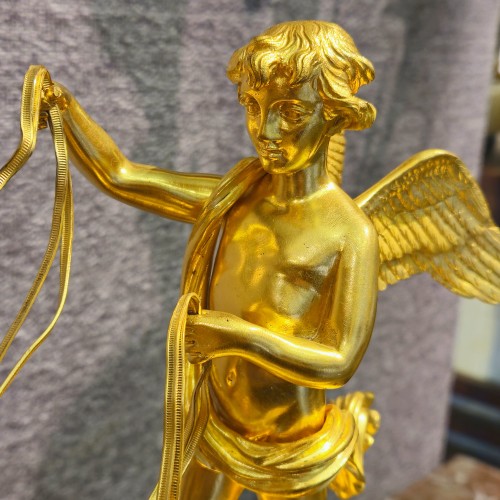 Empire - Cupidon au char, pendule Empire en bronze doré d'après Ravrio