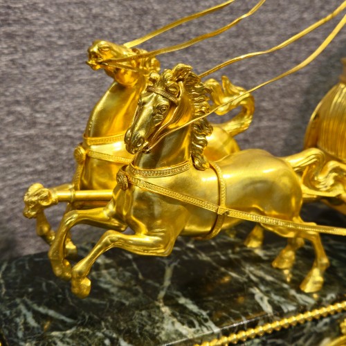 Antiquités - Cupidon au char, pendule Empire en bronze doré d'après Ravrio