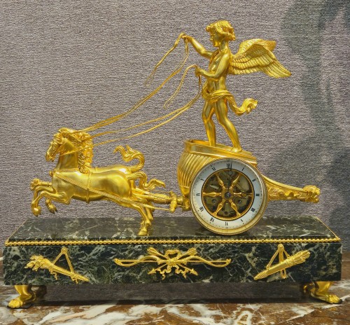 Antiquités - Cupidon au char, pendule Empire en bronze doré d'après Ravrio
