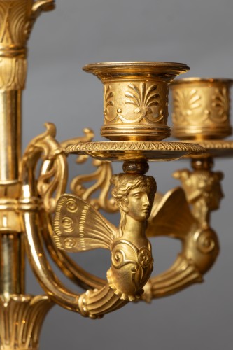 Luminaires Bougeoirs et Chandeliers - Paire de candélabres Empire en bronze doré et patiné signés Rabiat