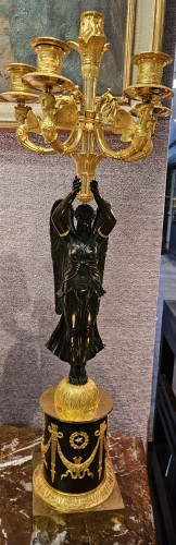 Antiquités - Paire de candélabres Empire en bronze doré et patiné signés Rabiat