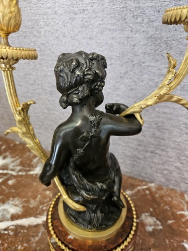 Napoléon III - Paire de candélabres aux putti en bronze doré et patiné