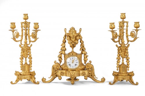 A late 19th century gilt bronze garniture de cheminée