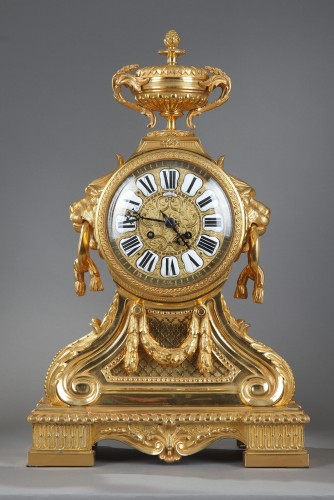 Importante garniture en bronze doré à gueules de lion - Horlogerie Style Louis-Philippe
