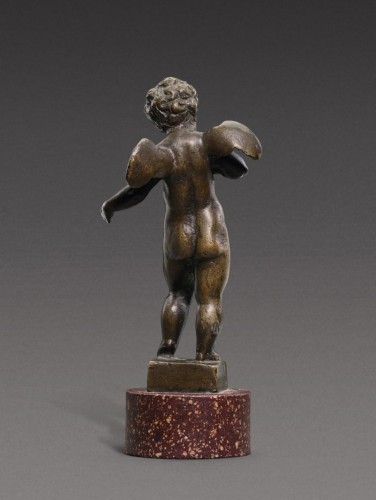 Bronze Figure of Young Cherub on porphyry base, Workshop of Roccatagliata - 
