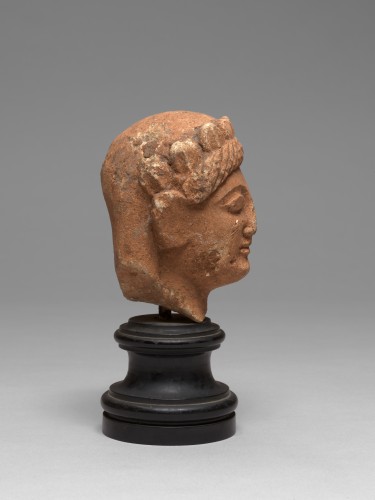 Cypriot limestone head of a female votary, late 6th-early 5th century bc - 