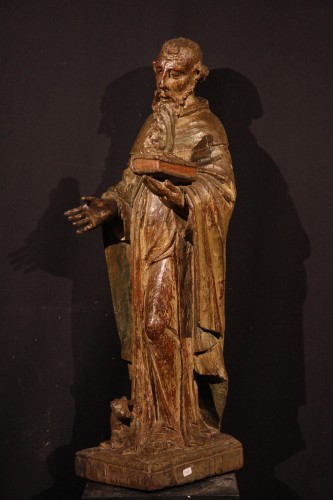 St. Anthony the Hermit., 16th C Carved oak statue with traces of polychromy - 