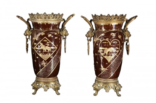 Late 19th C pair of vases in porcelain with bronze mounting.