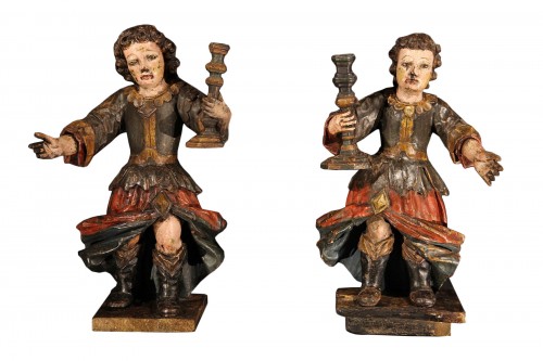 17th C Pair of candle holders in carved and polychrome walnut wood