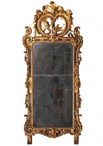 From Provence. 18th C large mirror in carved, gilt and lacquered wood.