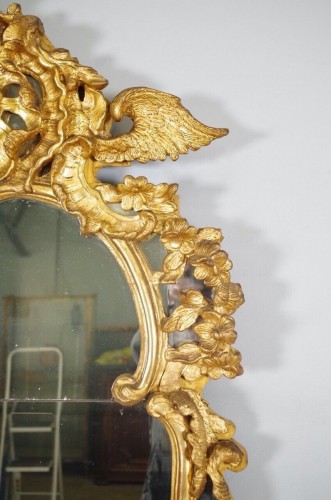 18th century - Large. Régence gilded wood mirror