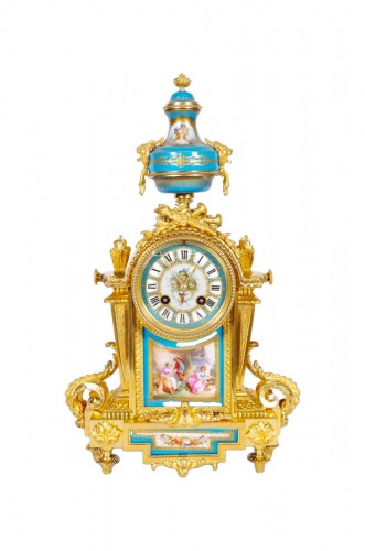 Pendule d'époque Napoléon III en bronze doré et porcelaine