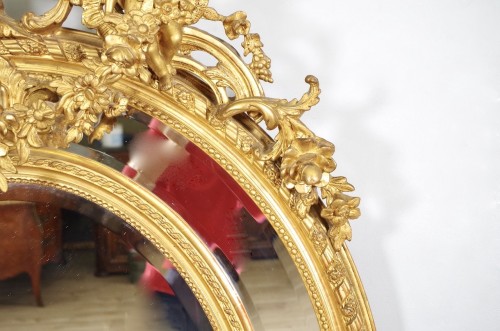 Antiquités - Large wood and gilded stucco Napoléon III mirror