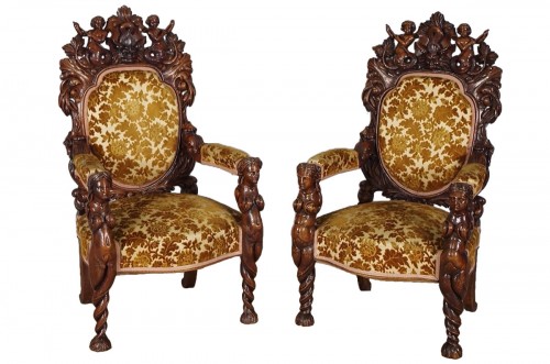 Pair of carved walnut ceremonial armchairs circa 1880
