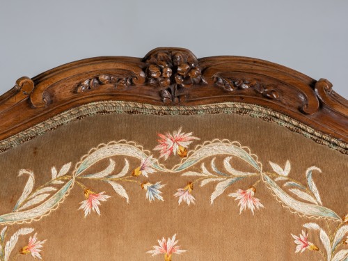 Fauteuil "coin de feu" estampillé C L. BURGAT  Epoque Louis XV - Louis XV