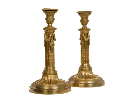 Paire de bougeoirs en bronze doré d'époque Louis XVI