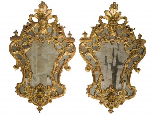 Paire de miroirs en bois doré et bras de lumière  Epoque Régence