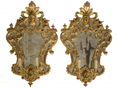 Paire de miroirs en bois doré et bras de lumière  Epoque Régence - Miroirs, Trumeaux Style Régence