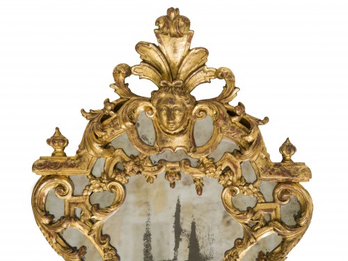 Miroirs, Trumeaux  - Paire de miroirs en bois doré et bras de lumière  Epoque Régence