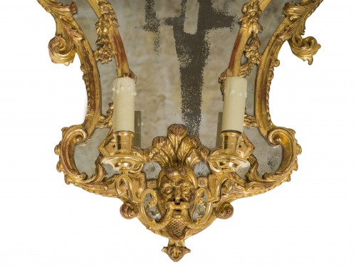 Antiquités - Paire de miroirs en bois doré et bras de lumière  Epoque Régence