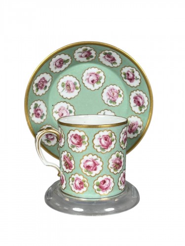 A Sèvres Hard-Paste Porcelain Cup and Saucer with Rose Garland Decoration