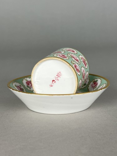 Porcelain & Faience  - A Sèvres Hard-Paste Porcelain Cup and Saucer with Rose Garland Decoration
