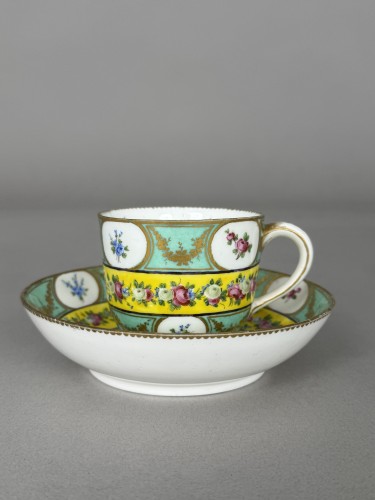 Porcelain & Faience  - Sèvres soft-paste porcelain cup and saucer with floral reserves
