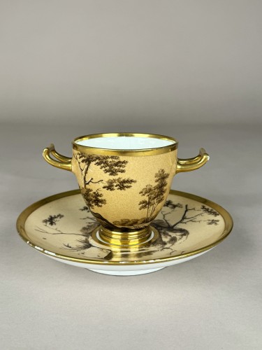 Porcelain & Faience  - Two-handled cup and saucer in Sèvres hard-paste porcelain with fond Nankin 