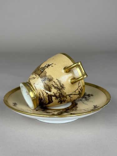 Empire - Two-handled cup and saucer in Sèvres hard-paste porcelain with fond Nankin 