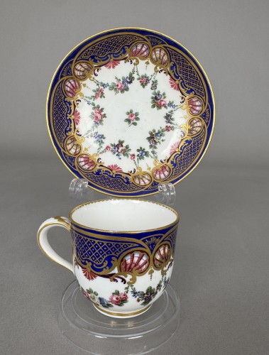 Sèvres soft-paste porcelain cup and saucer with &quot;coquille et guirlande&quot; dec - 