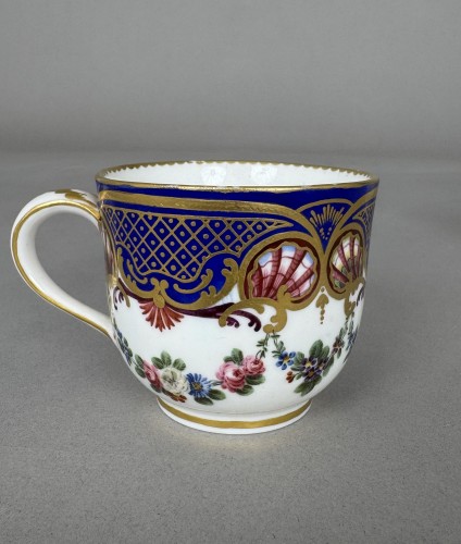 Sèvres soft-paste porcelain cup and saucer with &quot;coquille et guirlande&quot; dec - 