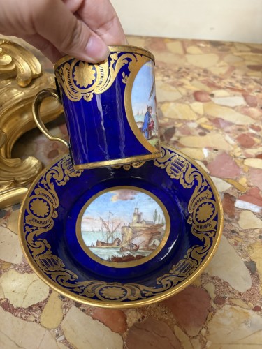 Sèvres soft-paste porcelain cup and saucer with harbor scene, Morin 1778 - 