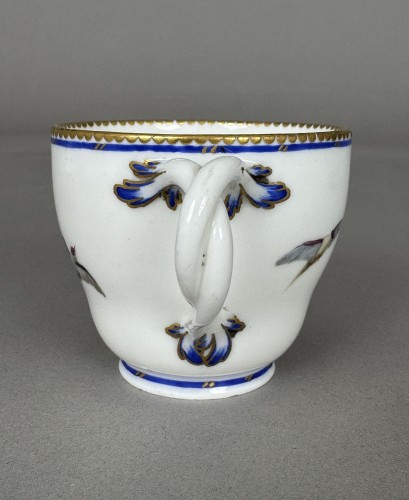 Antiquités - Sèvres soft-paste porcelain cup and saucer with owl and bird decoration