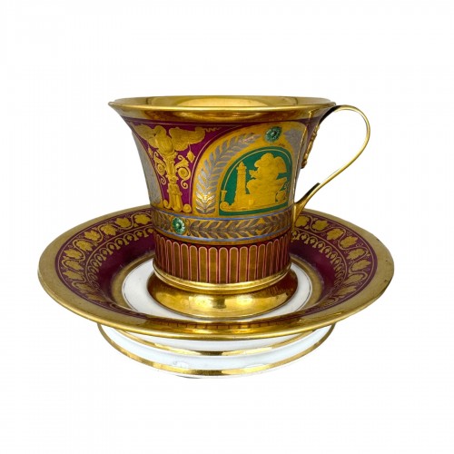 Sèvres "Three Gilt Cameo Putti" Cup and Saucer Set