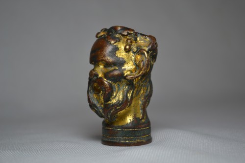 Objects of Vertu  - Gilt bronze head of Bacchus, Italian Renaissance cane knob, 16th century.