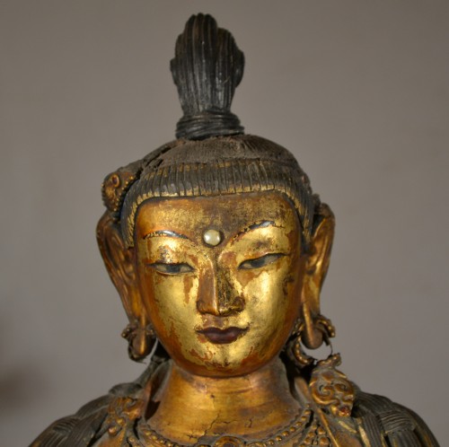 Asian Works of Art  - Gilded stucco Guanyin. China 14th century