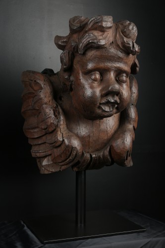 Paire de têtes d'anges en bois sculpté Flandres 17e siècle - Costermans Antiquités