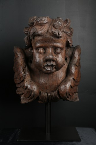 Antiquités - Paire de têtes d'anges en bois sculpté Flandres 17e siècle