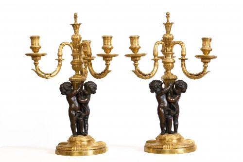 Paire de candélabres à trois bras et putti d'après Jean-Louis Prieur