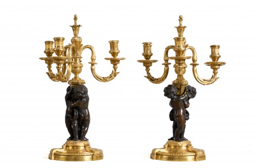Paire de candélabres à trois bras et putti d'après Jean-Louis Prieur - Costermans Antiquités