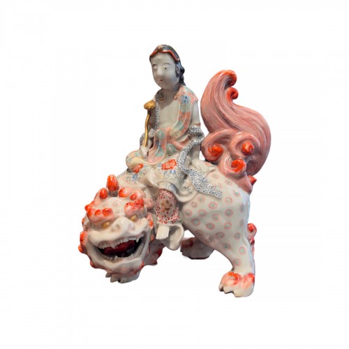 Japanese Kutani porcelain of Kannon riding a Shishi, 19th century