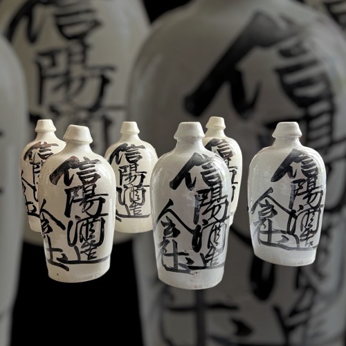 Asian Works of Art  - Japan, collection of 6 sake bottles (tokkuri)  enamelled stoneware, late 19
