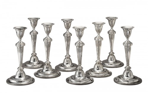 Eight silver candlesticks by François Marcus Simons