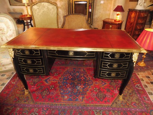 Bureau plat à caissons d'époque Régence, en placage d'ébène incrusté de laiton - Mobilier Style Régence