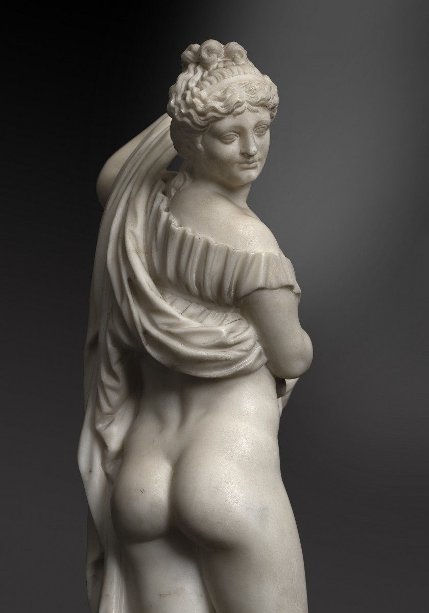 AN ITALIAN MARBLE FIGURE OF THE CALLIPYGIAN VENUS