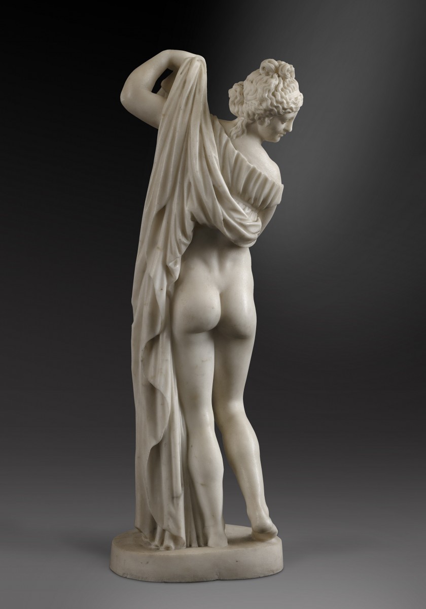 AN ITALIAN MARBLE FIGURE OF THE CALLIPYGIAN VENUS