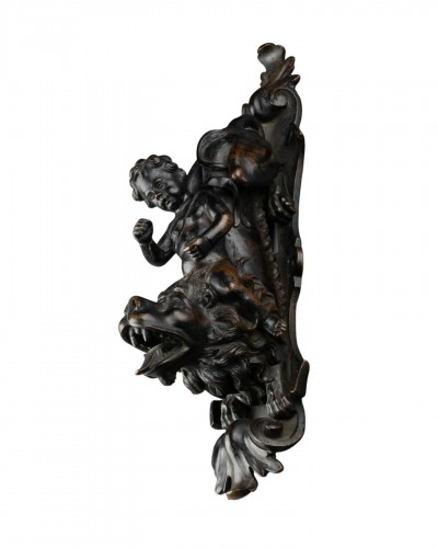 Flemish bronze fitting, Putto on a lion
