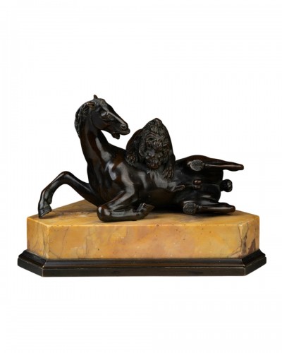 Lion attaquant un cheval